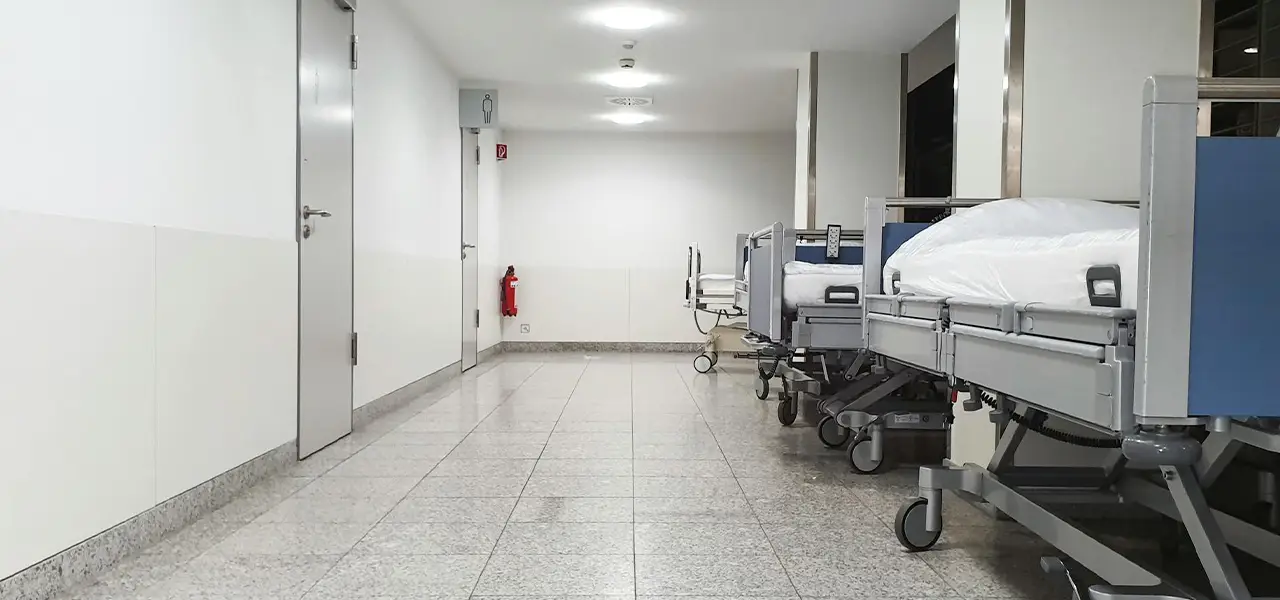 Healthcare facility water damage restoration with ICRA-compliant containment and infection control protocols in hospital setting